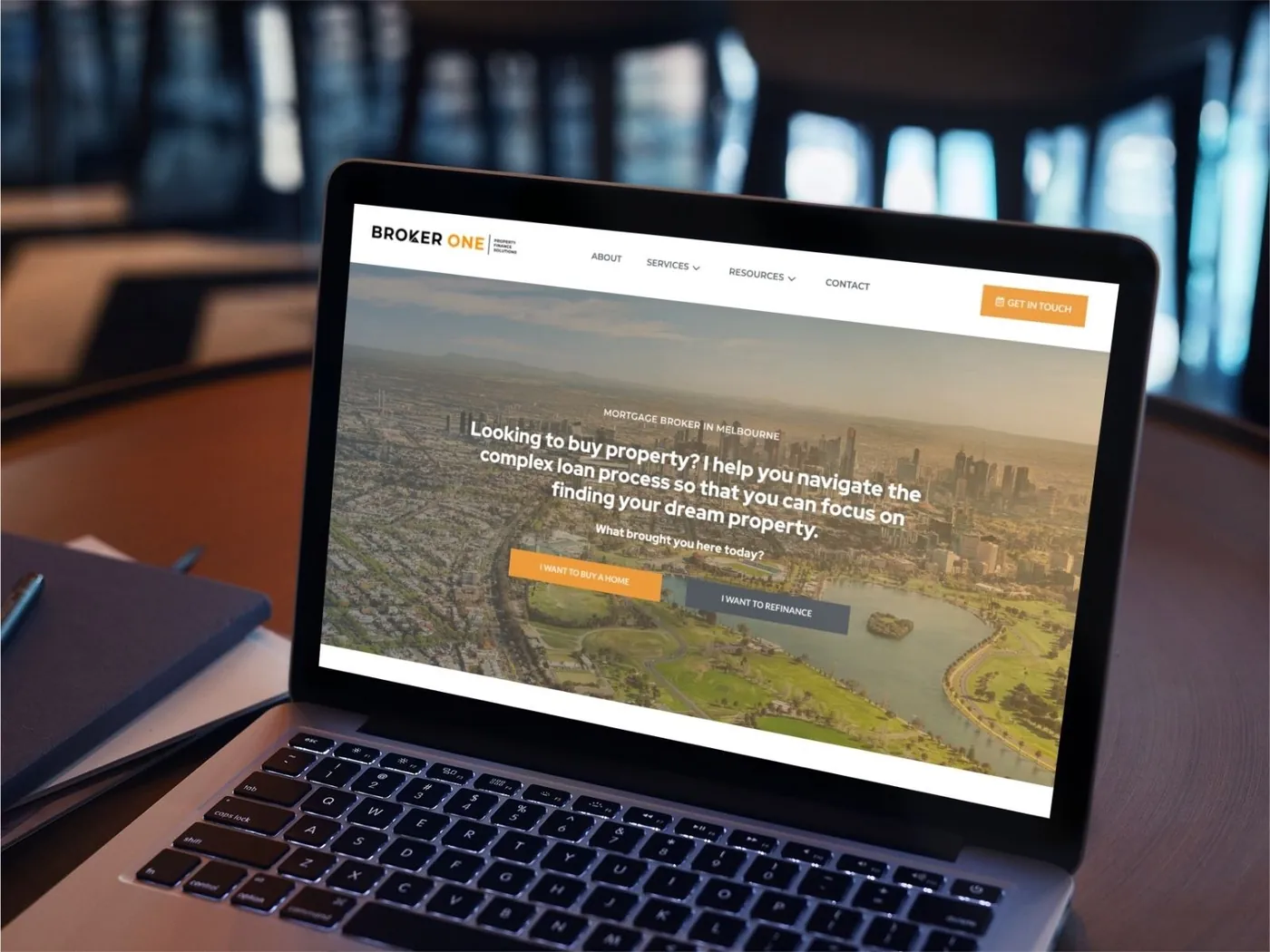 Broker One Finance mortgage broker website on a laptop, designed by SKCREATIVE in Melbourne